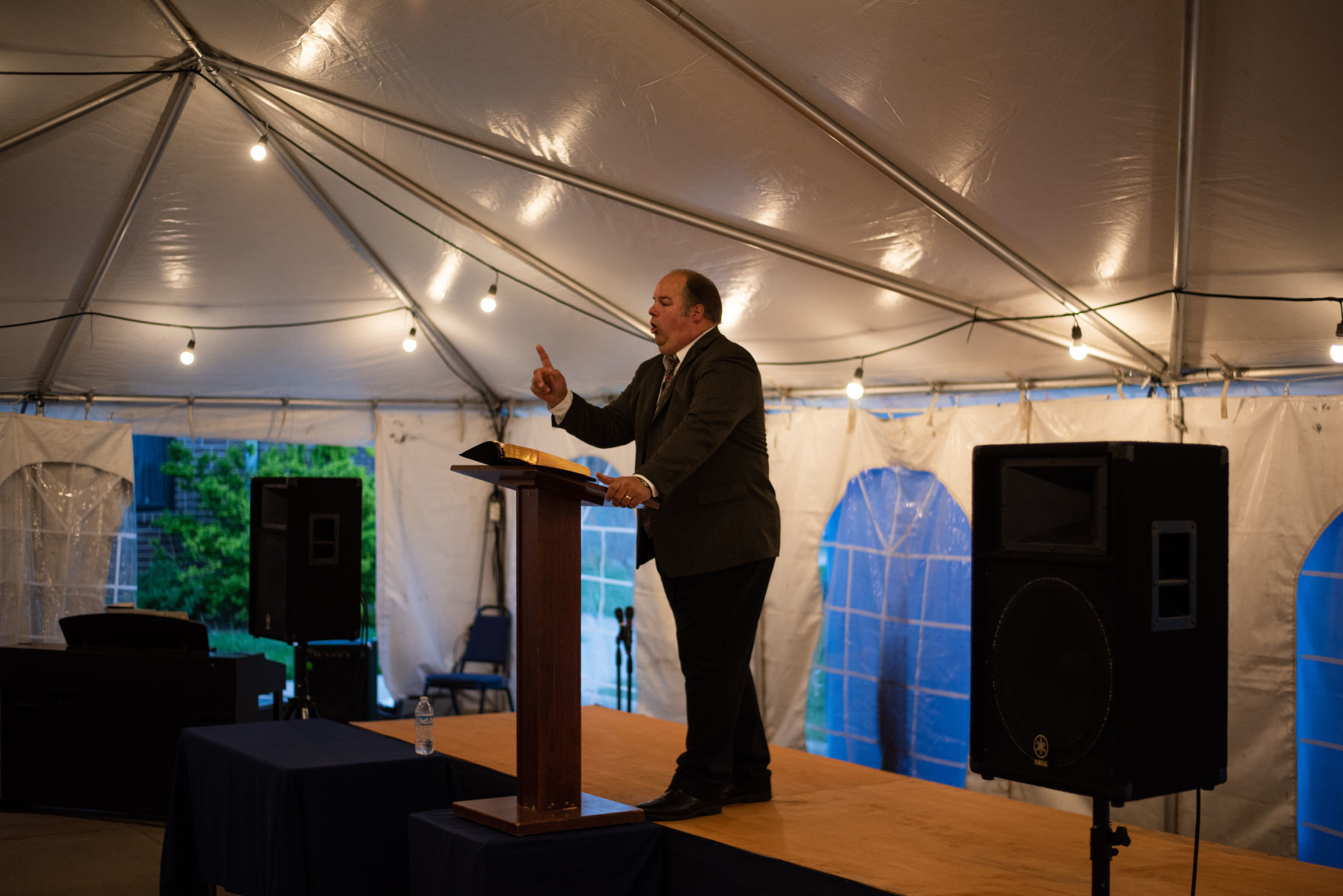 Pastor Stephen Henderson preaches at Harvest Baptist Church on Wednesday.